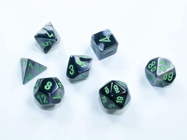 Mini 7-die set from Chessex, featuring colorful polyhedral dice for tabletop gaming, displayed on a white background.