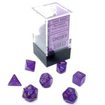 Seven-sided Chessex mini-hedral die from THE MIGHTY HOBBY SHOP, showing colorful numbered faces on a white background.