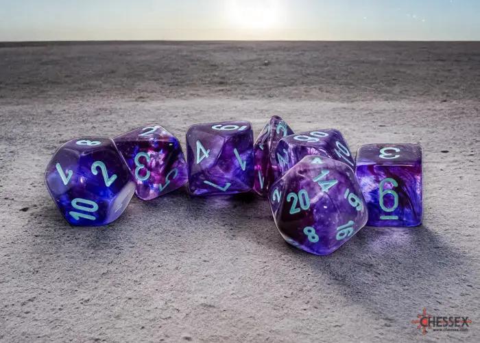 Nebula Mega-hedral Nocturnal turquoise 7-Die Set from THE MIGHTY HOBBY SHOP, includes various shaped polyhedral dice for tabletop gaming.