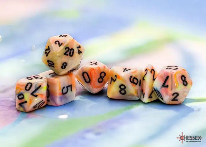 Black 7-Die set with festive circus-themed designs from THE MIGHTY HOBBY SHOP, featuring colorful patterns and numbered faces.