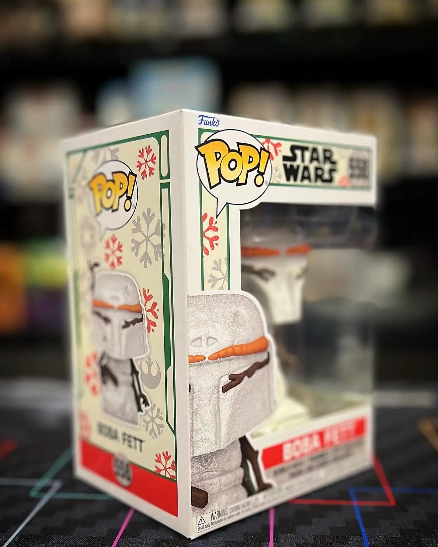 POP! Star Wars Holiday Boba Fett Funko figure in festive holiday attire, collectible toy from THE MIGHTY HOBBY SHOP