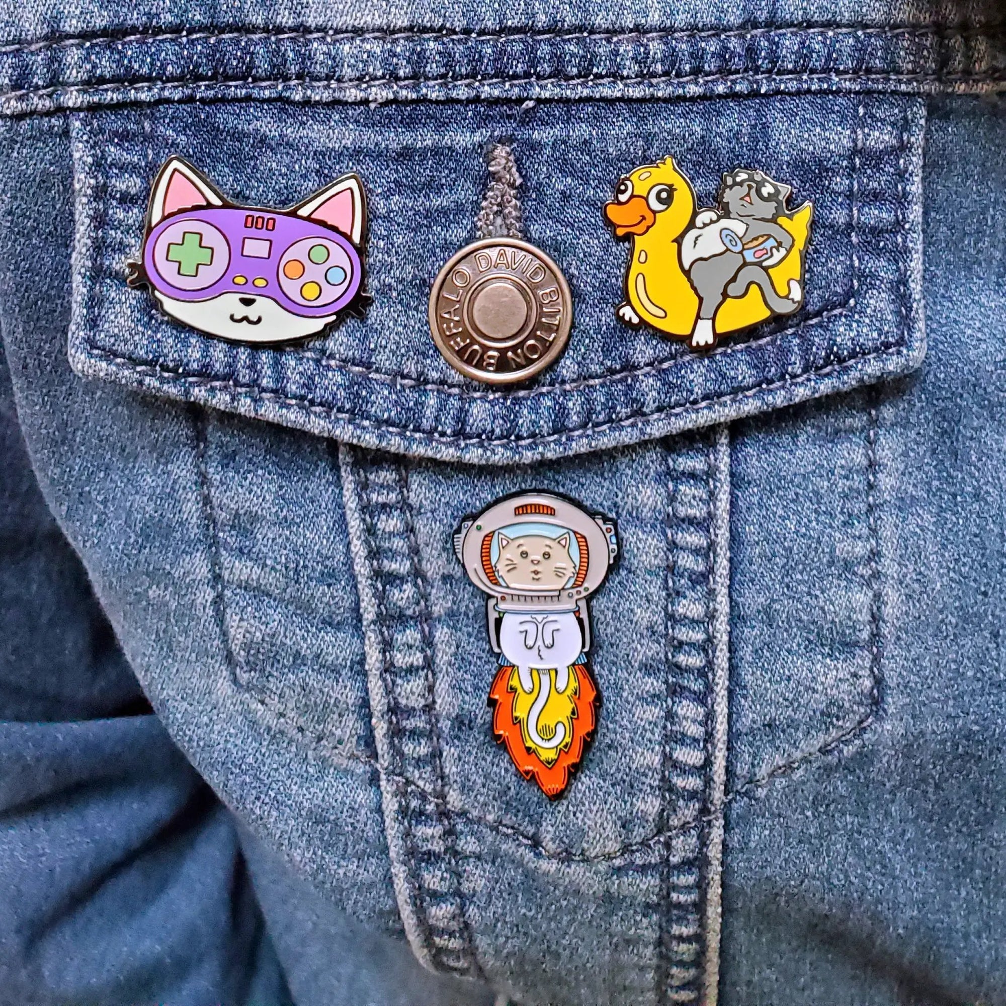 Kolorspun Controller Cat Pin featuring a playful cat design on a decorative pin, perfect for accessories and collectables