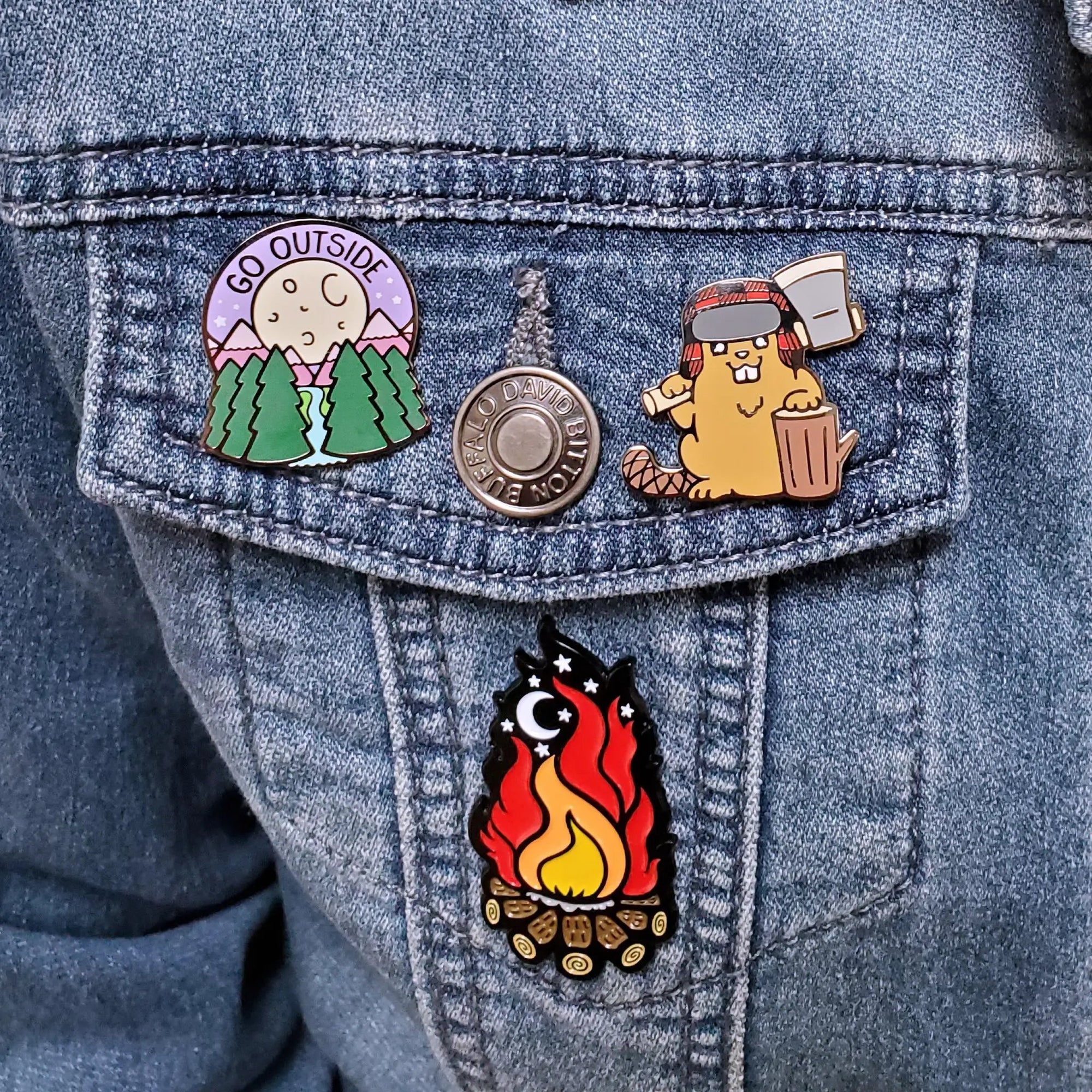 Kolorspun Go Outside pin featuring a nature-inspired design, perfect for jackets and outdoor enthusiasts.