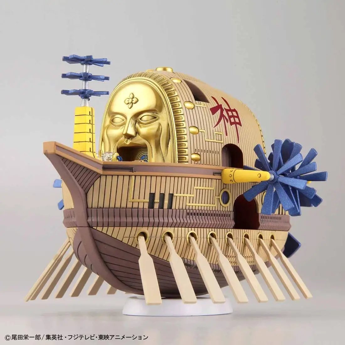 Detailed view of the One Piece Grand Ship Collection Ark Maxim model kit featuring intricate ship parts and colorful design details.