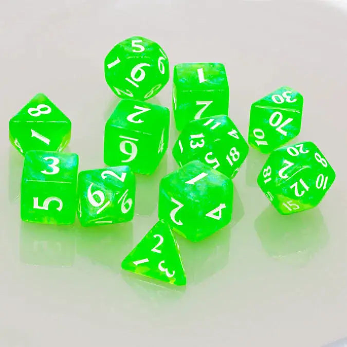 Lime green Eclipse acrylic RPG dice set with 11 polyhedral dice from THE MIGHTY HOBBY SHOP, arranged on a white background.