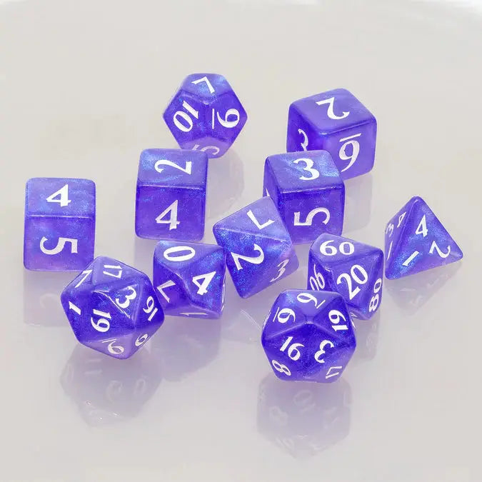 Set of 11 royal purple Eclipse acrylic RPG dice from THE MIGHTY HOBBY SHOP, including various numbered dice for tabletop gaming.