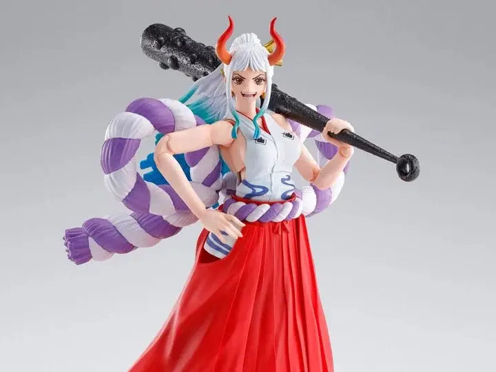 Highly detailed Yamato One Piece S.H.Figuarts action figure from THE MIGHTY HOBBY SHOP, posed with accessories and vibrant colors.
