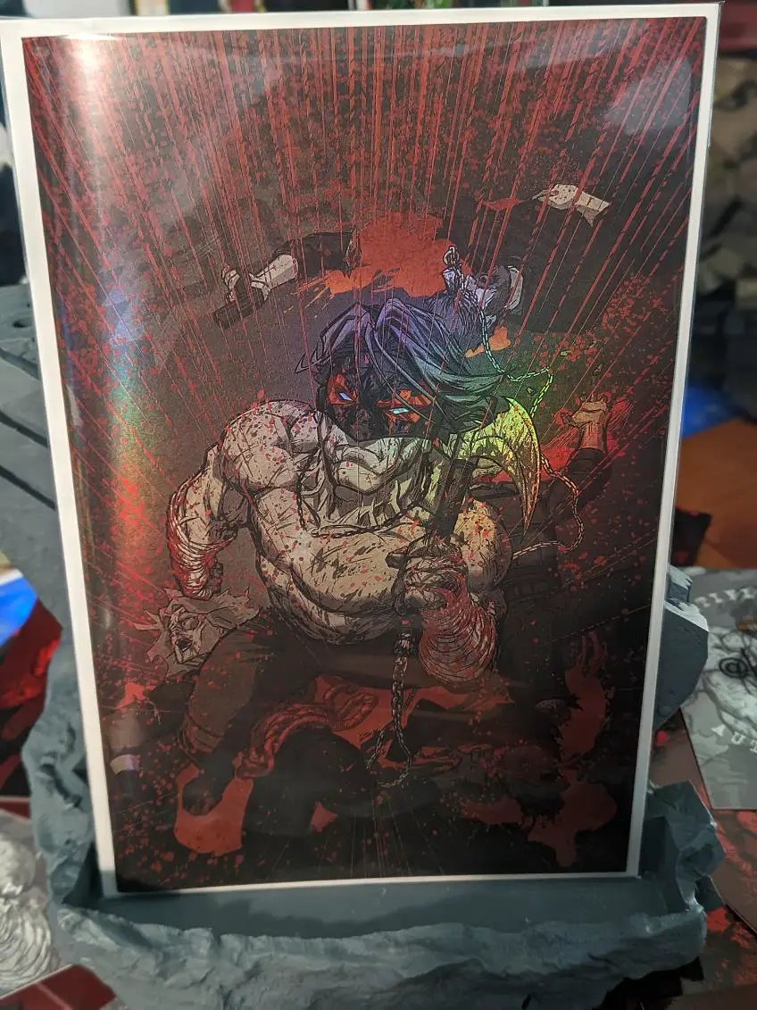 Final Boss 4 black and blood foil comic by Jams Fortress Comics, featuring cover art by Todd Beats and Tyler Kirkham story art.