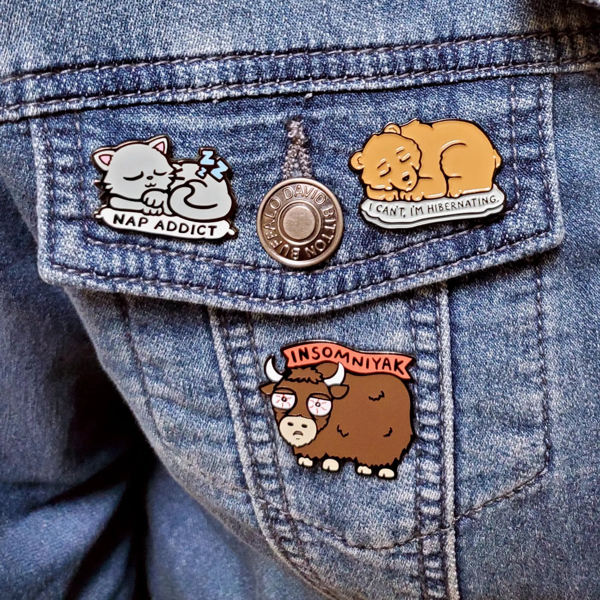 Kolorspun Hibernating Pin featuring a detailed sleeping jacket design, perfect for collectors and pin enthusiasts.