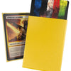 Yellow Cortex Sleeves Matte Standard Size (100) by The Mighty Hobby Shop, showing close-up of smooth, flexible plastic sleeves for collectibles.