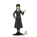 Wednesday Toony Terrors Series 1 6-inch action figure from THE MIGHTY HOBBY SHOP, featuring her signature outfit and cartoon style.