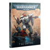 T'au Empire Warhammer 40,000 Codex book with cover art featuring T'au symbols and futuristic design elements.