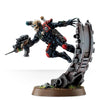 Eversor Assassin miniature from Warhammer 40,000: Imperial Agents, detailed model in combat gear with weapons, on a display base