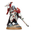 Warhammer 40,000 T'au Empire Cadre Fireblade model figure, detailed miniature with armor and weaponry, on a display base.