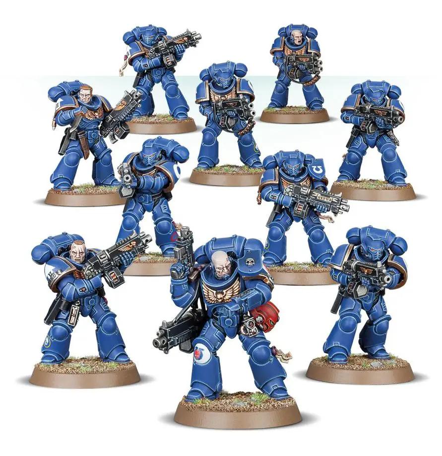 Space Marines Intercessor Squad miniatures from The Mighty Hobby Shop, showing detailed figures in armor with weapons.