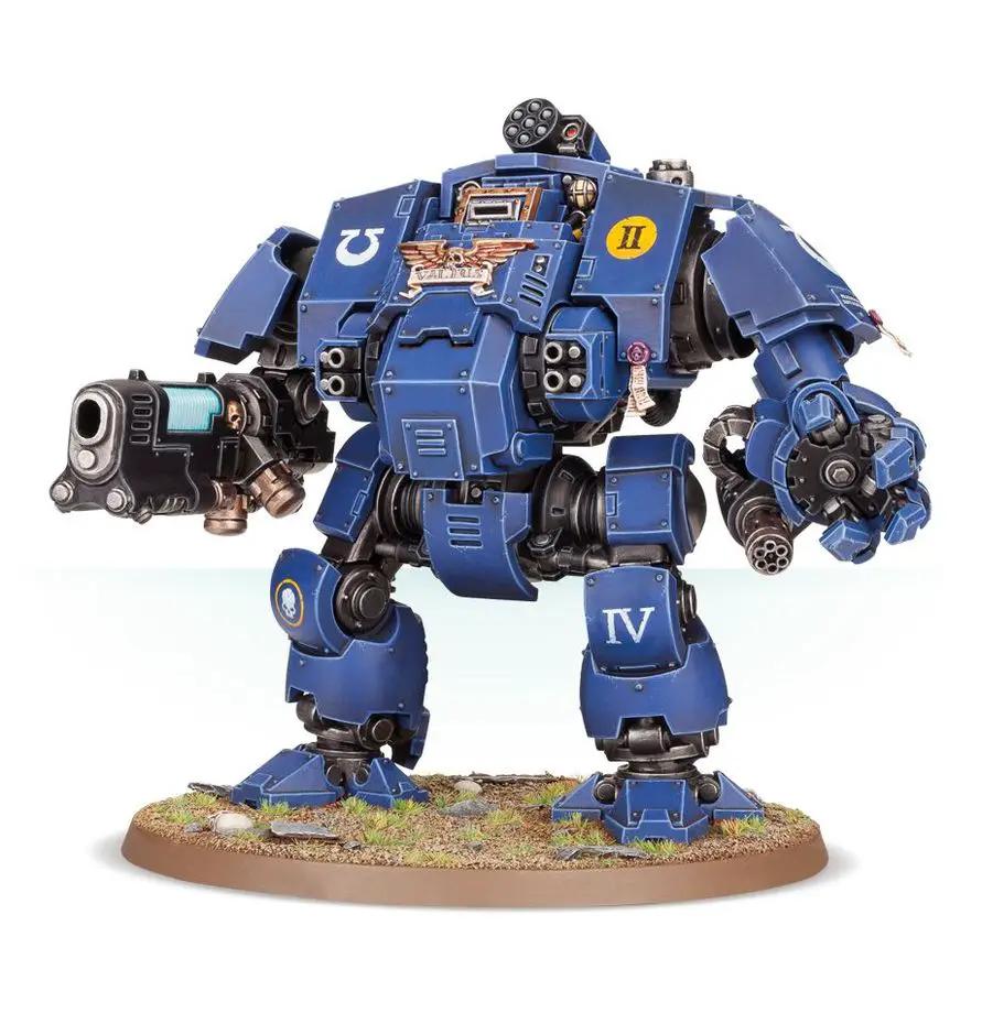 Primaris Redemptor Dreadnought miniature from Warhammer 40K with detailed armor and weaponry, posed on a display base.