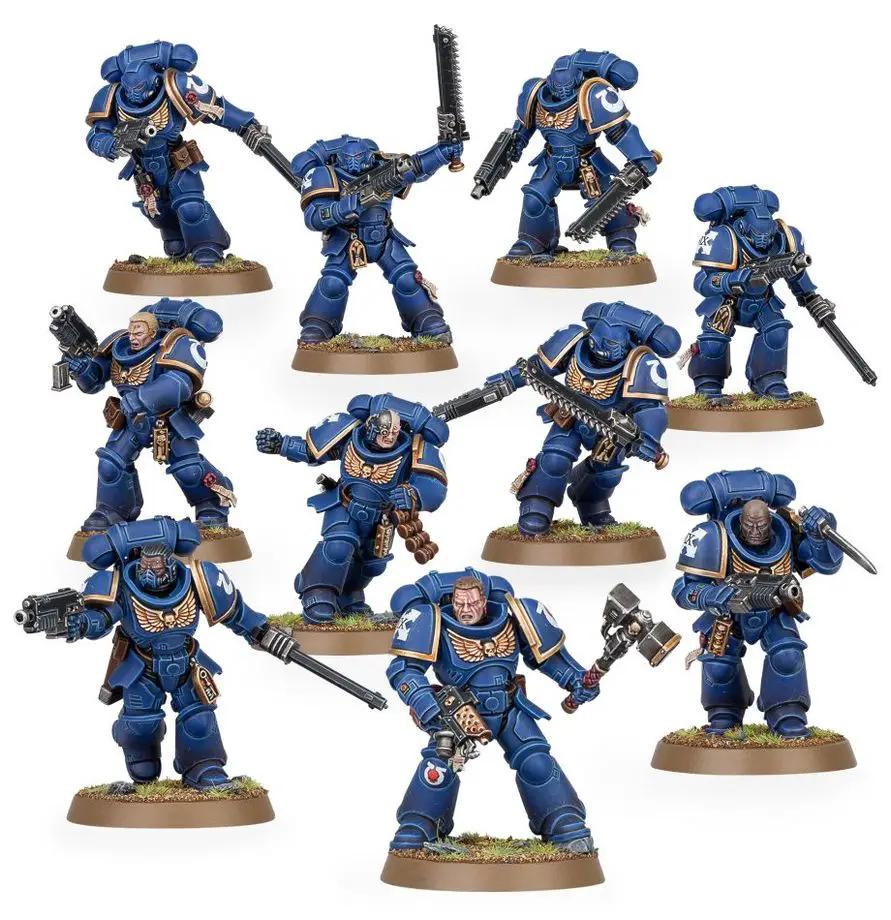 Space Marines Assault Intercessor Squad with bolters and armor, detailed figures from THE MIGHTY HOBBY SHOP.