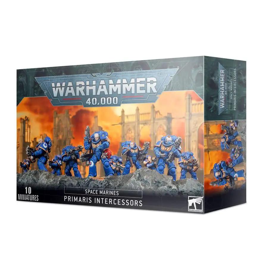 Space Marines Intercessor Squad in armor, armed with bolters, standing in a battle-ready pose, from THE MIGHTY HOBBY SHOP.