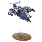 Space Marines Stormhawk Interceptor model from THE MIGHTY HOBBY SHOP, detailed miniature with blue and gray armor and wings.