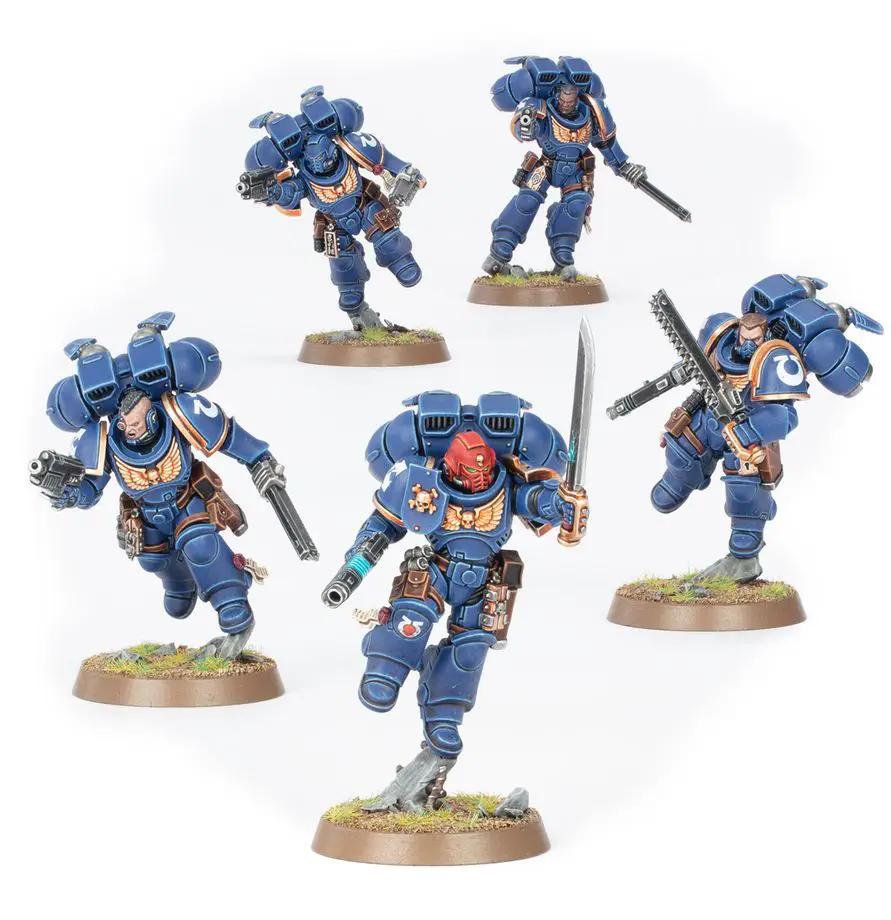 Space Marines Assault Intercessors with Jump Packs from THE MIGHTY HOBBY SHOP, featuring detailed armor and weaponry.