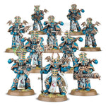 Thousand Sons Rubric Marines miniatures from THE MIGHTY HOBBY SHOP featuring painted models in detailed armor.