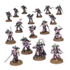 Miniature group of Emperor's Children Chaos Space Marines with detailed armor and weapons from Combat Patrol series.