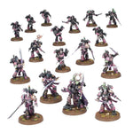 Miniature group of Emperor's Children Chaos Space Marines with detailed armor and weapons from Combat Patrol series.