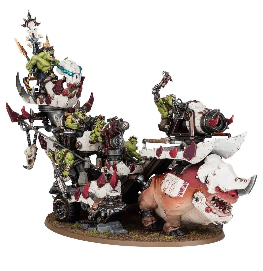 Orks Kill Rig model from THE MIGHTY HOBBY SHOP, featuring detailed Ork figures on a rugged, war-torn terrain base.