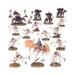 Close-up of Tyranid Assault Brood miniatures from Combat Patrol set, featuring detailed alien insectoid creatures and monstrous figures.
