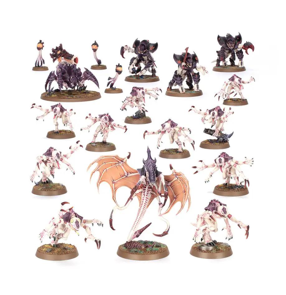 Close-up of Tyranid Assault Brood miniatures from Combat Patrol set, featuring detailed alien insectoid creatures and monstrous figures.