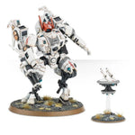 Warhammer 40,000 T'au Empire Commander miniature from The Mighty Hobby Shop, featuring detailed armor and weaponry.