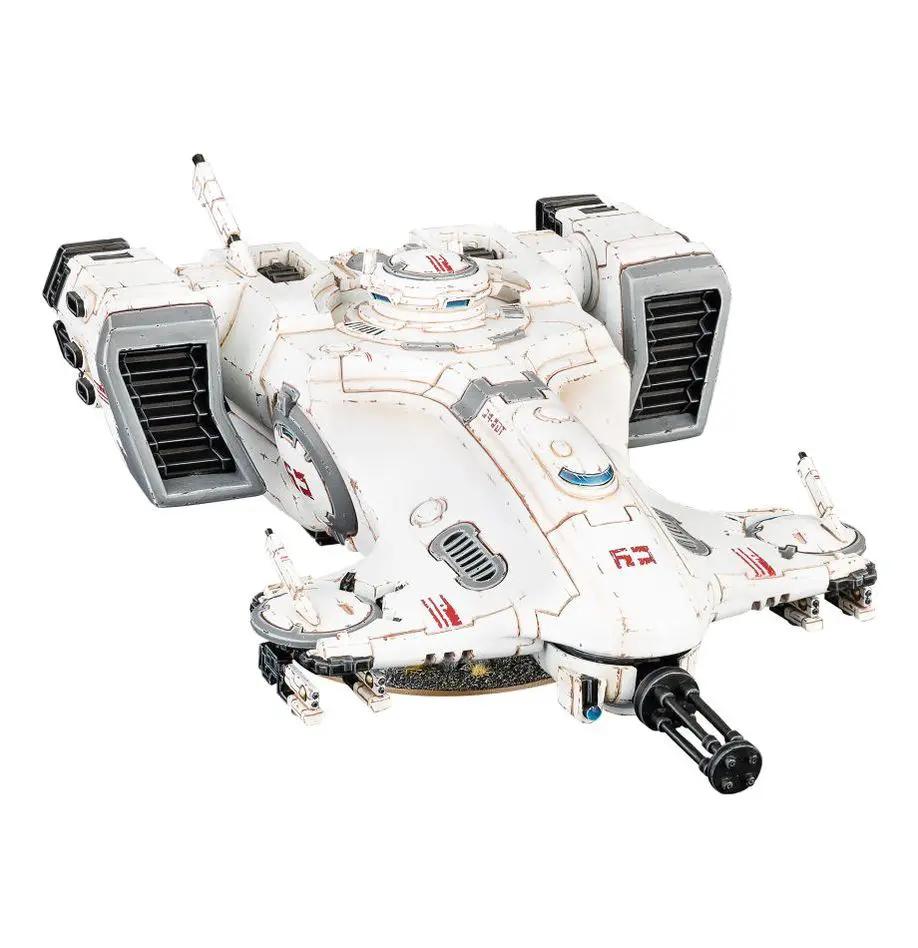T'au Empire Devilfish model from Warhammer 40,000, featuring detailed military vehicle with sleek blue and white armor.