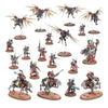 Adeptus Mechanicus Combat Patrol miniatures set from Warhammer 40K, featuring robotic units and tech-priest figures on a gaming table.