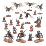 Adeptus Mechanicus Combat Patrol miniatures set from Warhammer 40K, featuring robotic units and tech-priest figures on a gaming table.