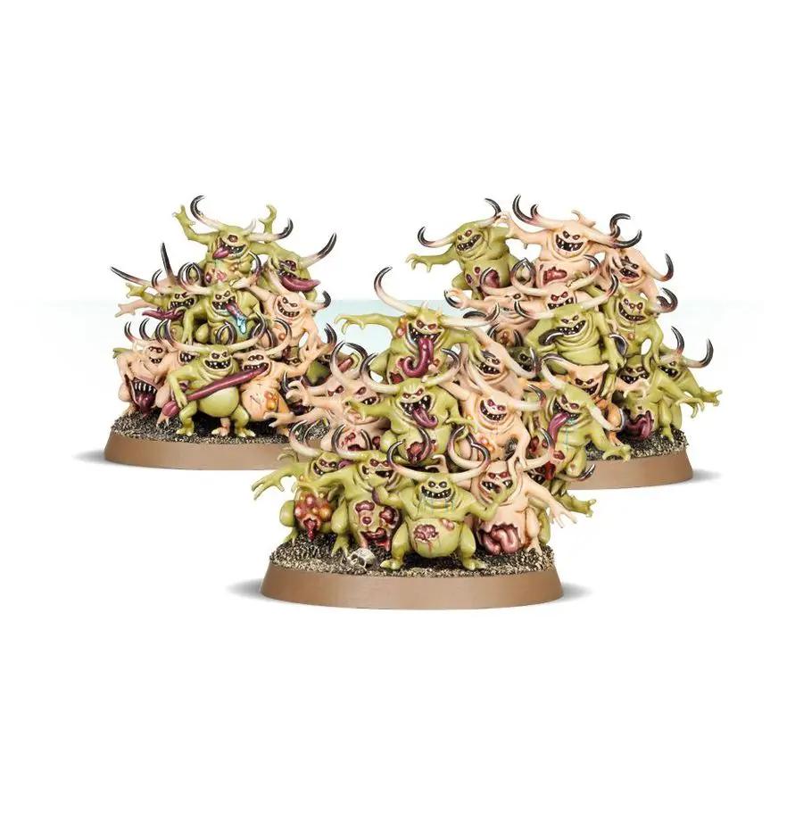 Group of Nurgling miniatures from Warhammer Age of Sigmar, featuring small, green, tentacled creatures with grotesque expressions.