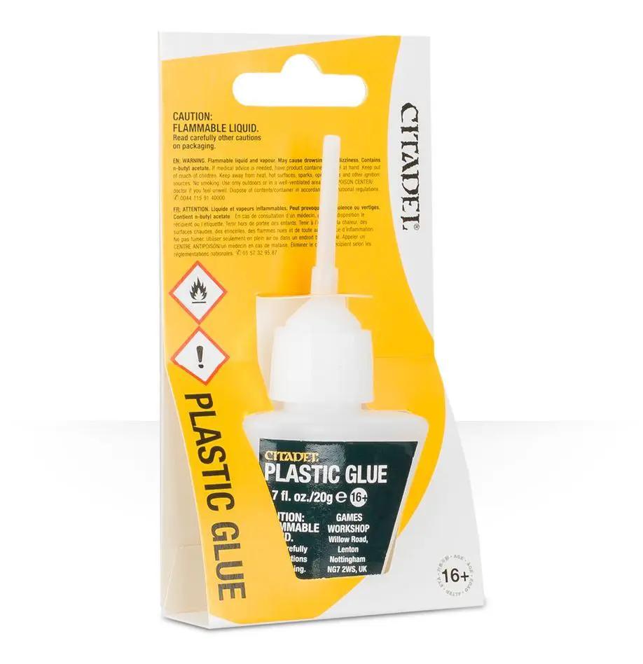 Plastic glue for Warhammer models from THE MIGHTY HOBBY SHOP, shown in a tube with applicator for assembling plastic miniatures.