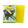 Yellow and silver matte Dragon Shield dual sleeves from THE MIGHTY HOBBY SHOP, shown in a close-up image.