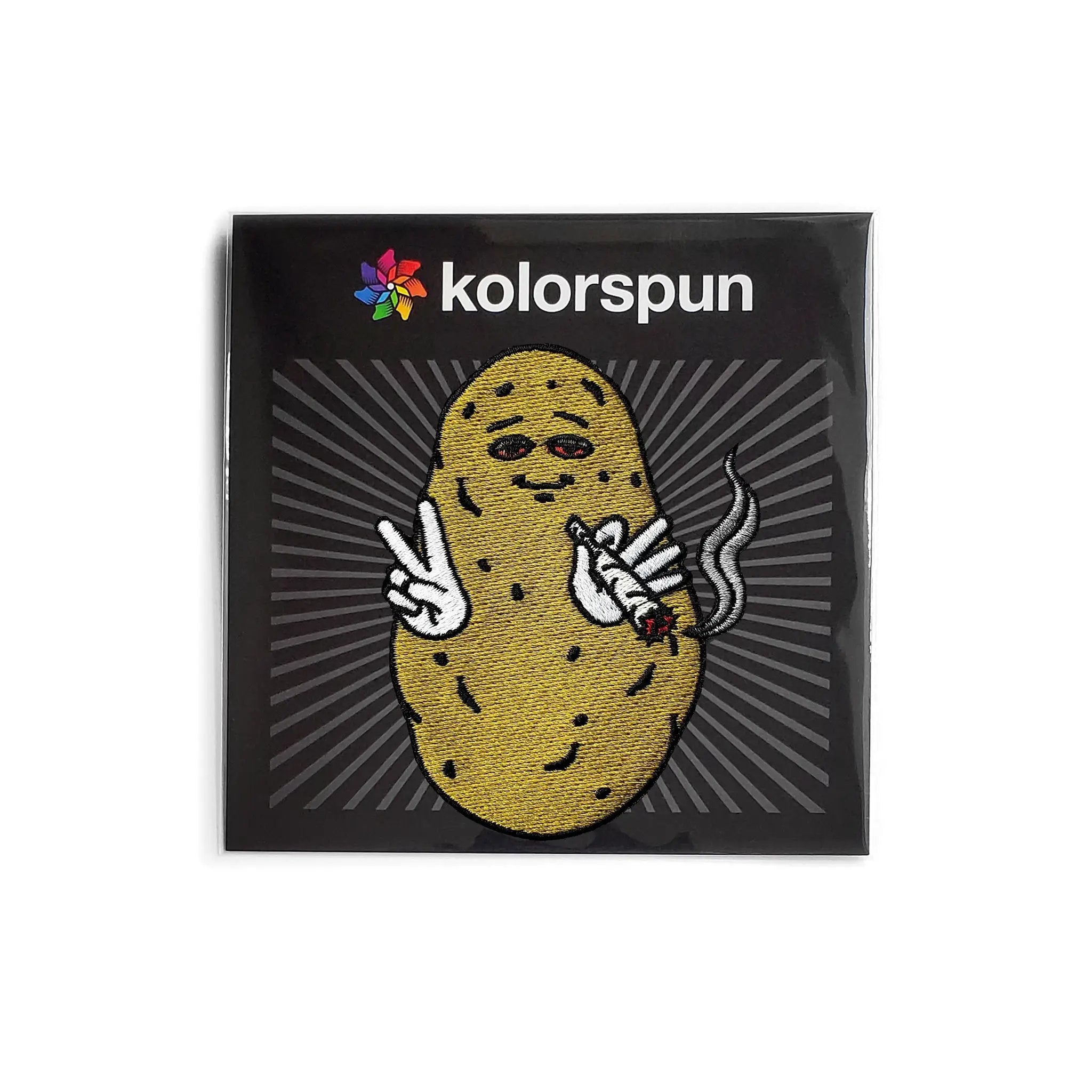Kolorspun baked potato patch with embroidered potato design on fabric, showcasing detailed stitching and vibrant colors.