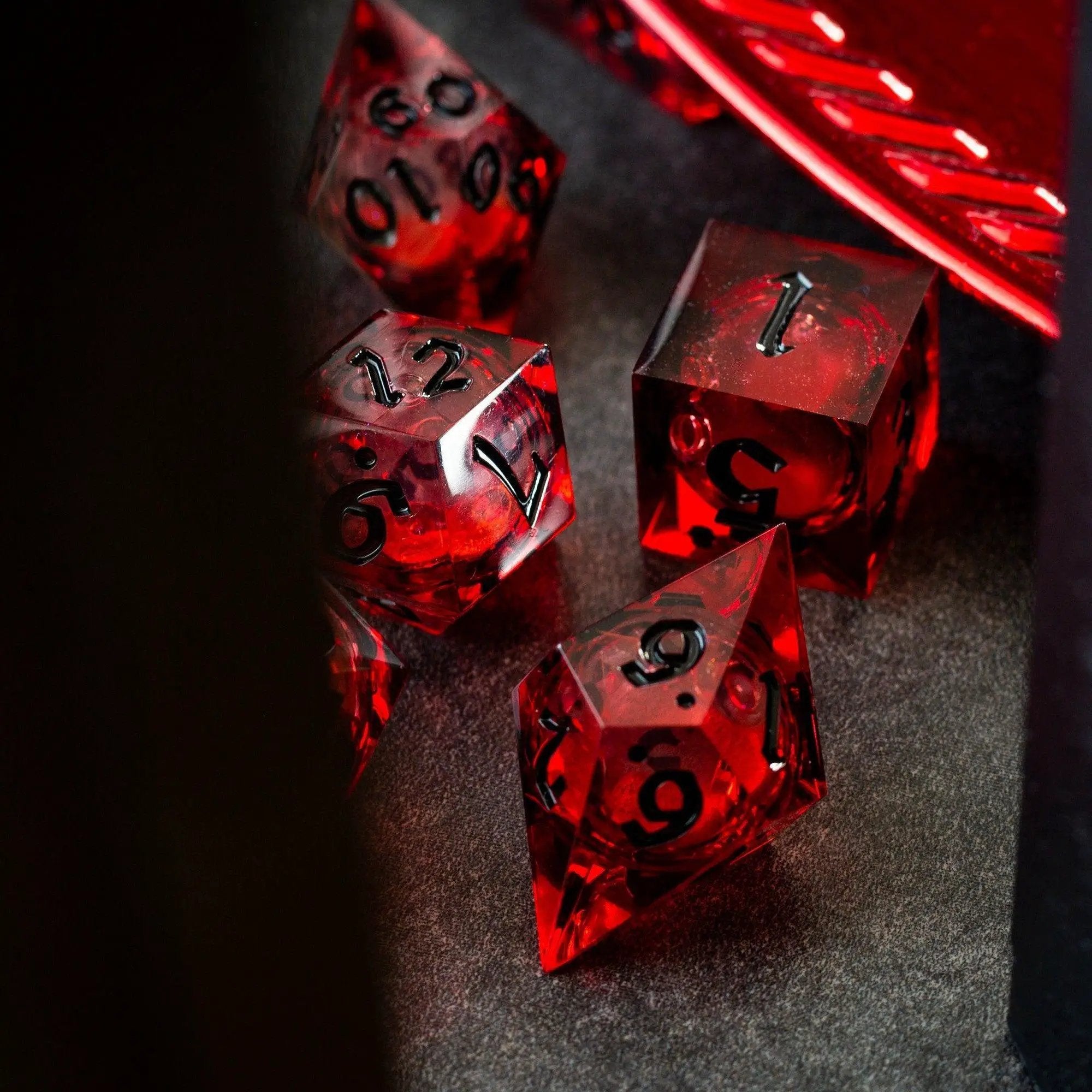 Blood red glitter liquid core handmade resin DND dice set by Runic Dice, featuring six vibrant, shimmering gaming dice.