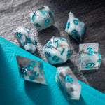 Blue cloud-themed handmade resin DND dice set from Runic Dice, featuring various multi-sided resin gaming dice.
