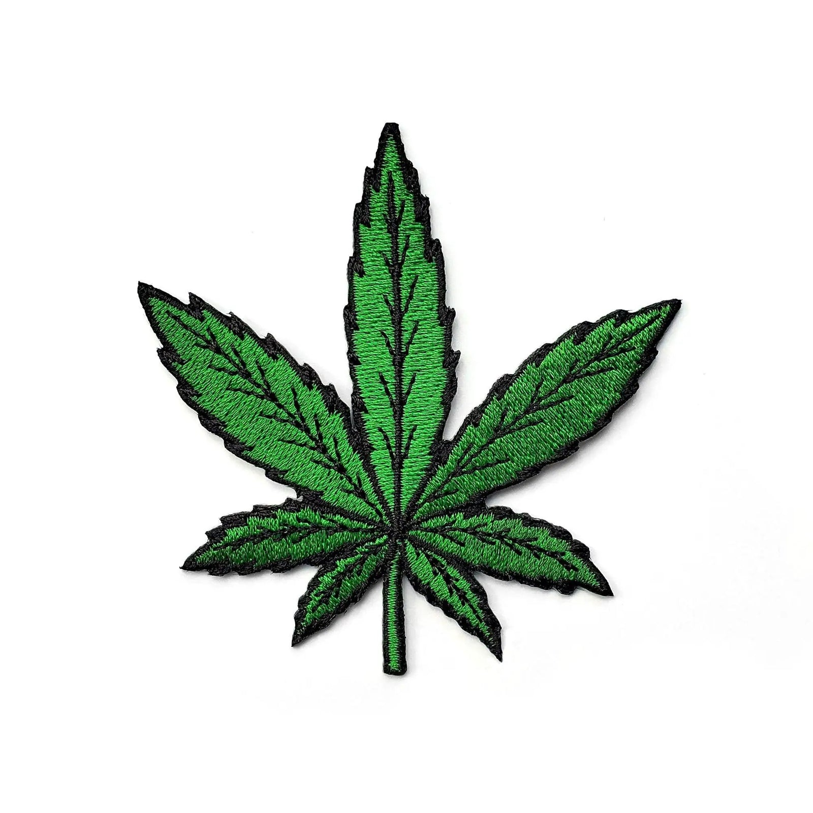 Kolorspun cannabis leaf patch, an iron-on fabric patch featuring a detailed green cannabis leaf design.