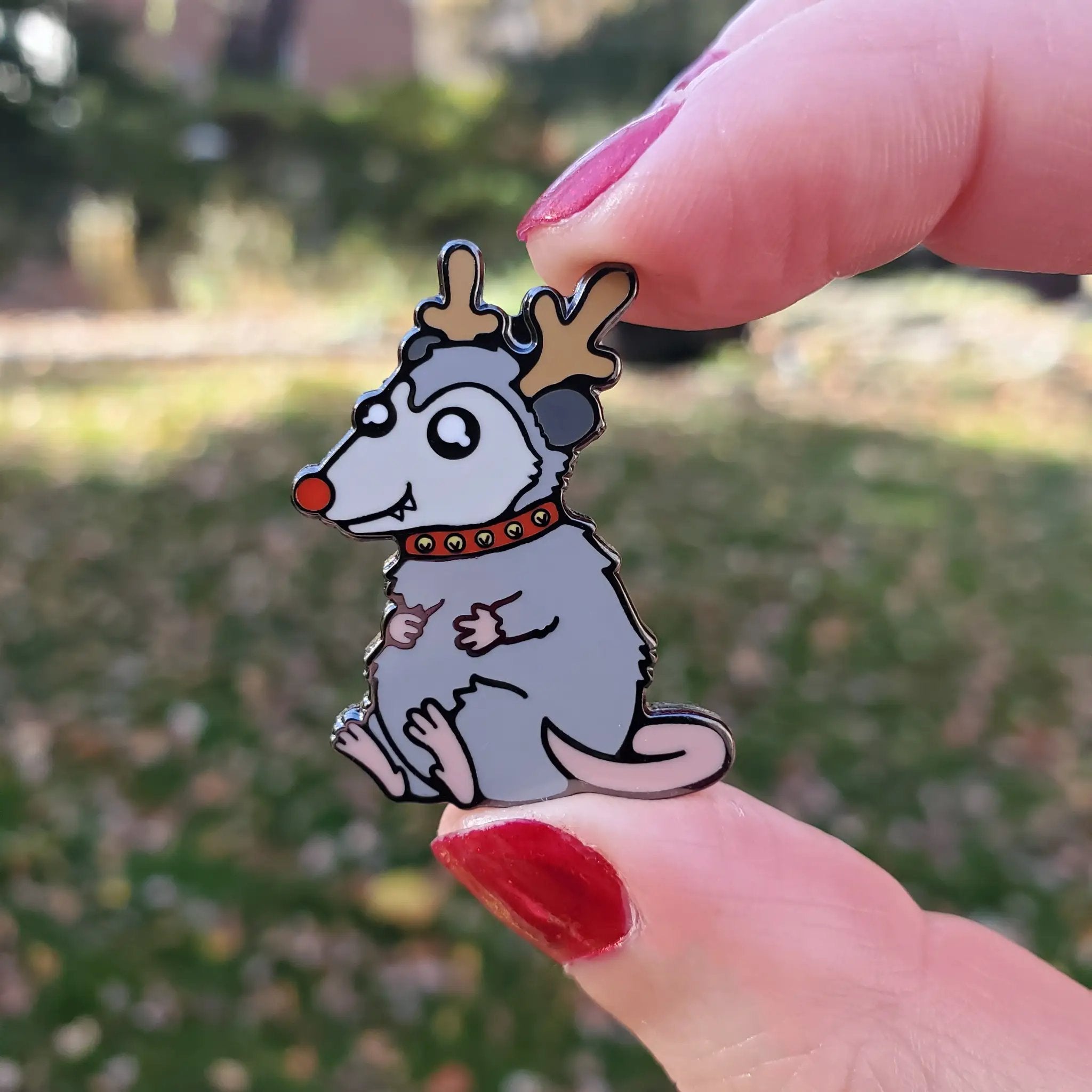 Kolorspun Reindeer Possum pin featuring a festive Christmas possum design on a metal pin.