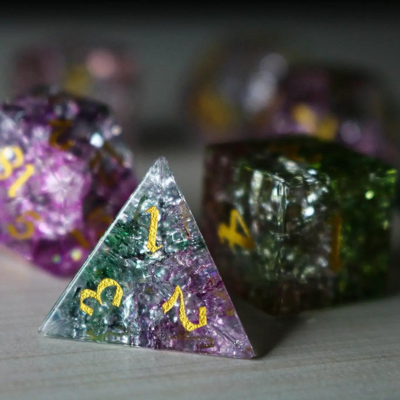 Dark Nox Forge fire glass gemstone D&D dice set by Runic Dice, featuring vibrant, fiery-colored polyhedral dice for tabletop gaming.