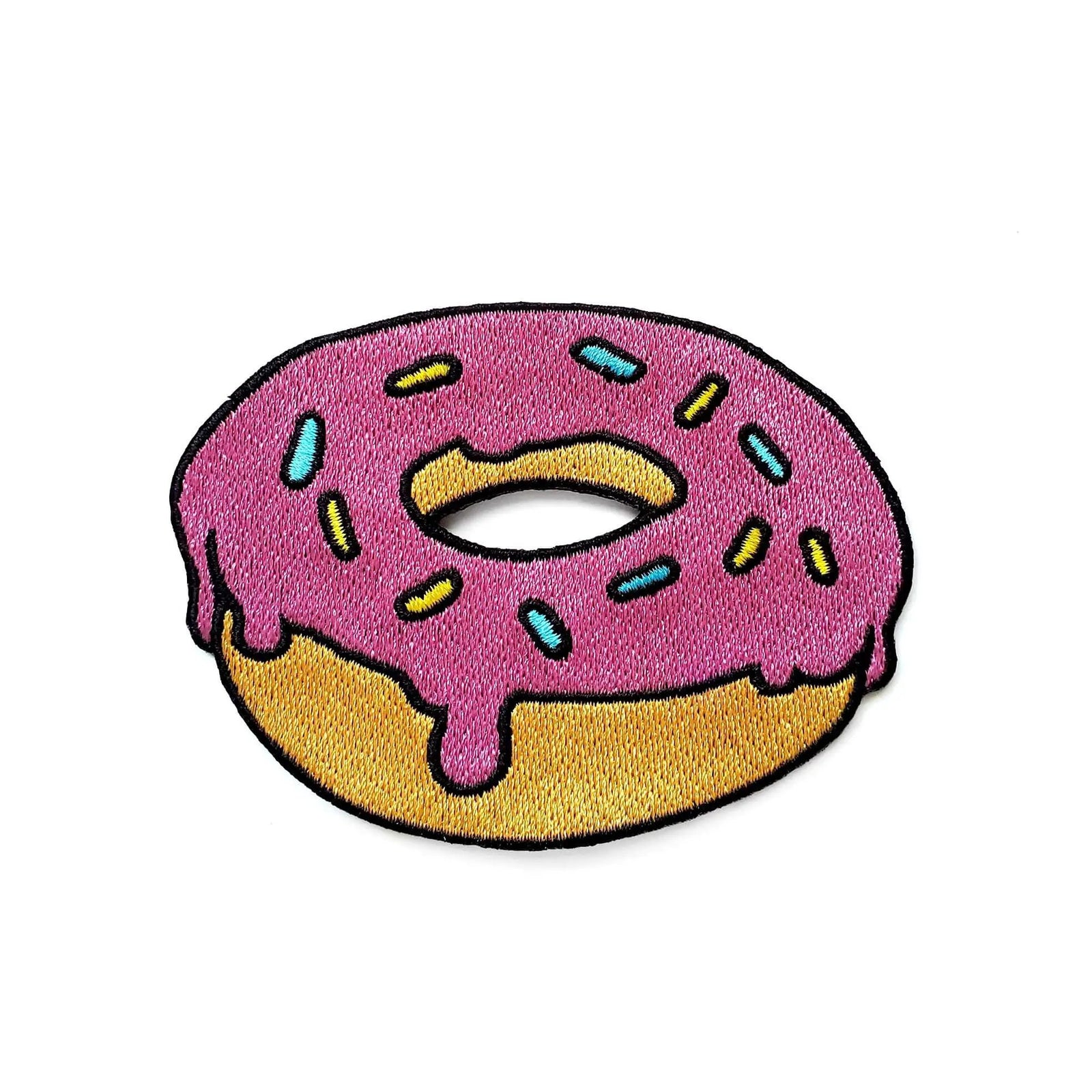 Colorful donut patch by Kolorspun featuring a vibrant, embroidered design ideal for clothing or accessories.