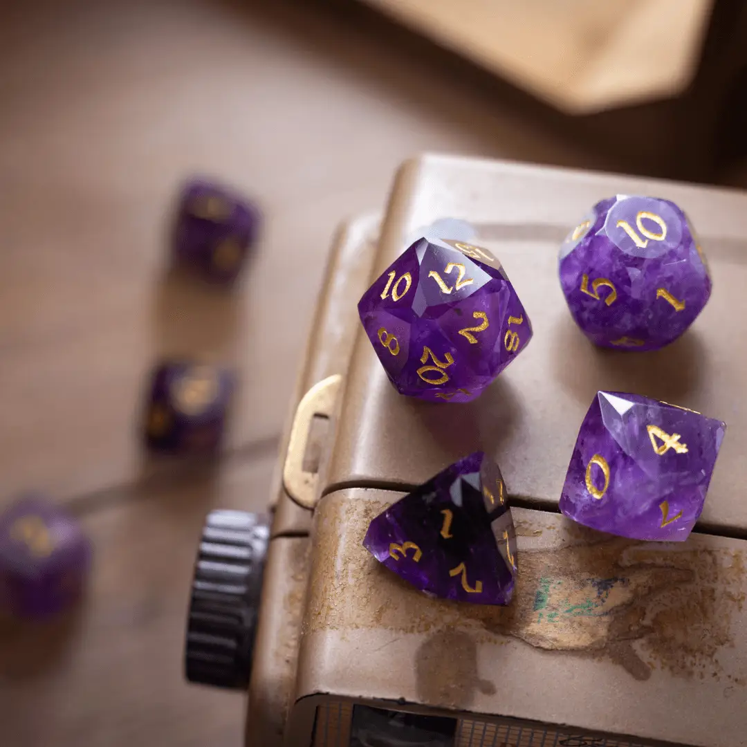 Dwarf cut purple amethyst gemstone DND dice set by Runic Dice featuring polished, faceted gemstone dice for tabletop gaming