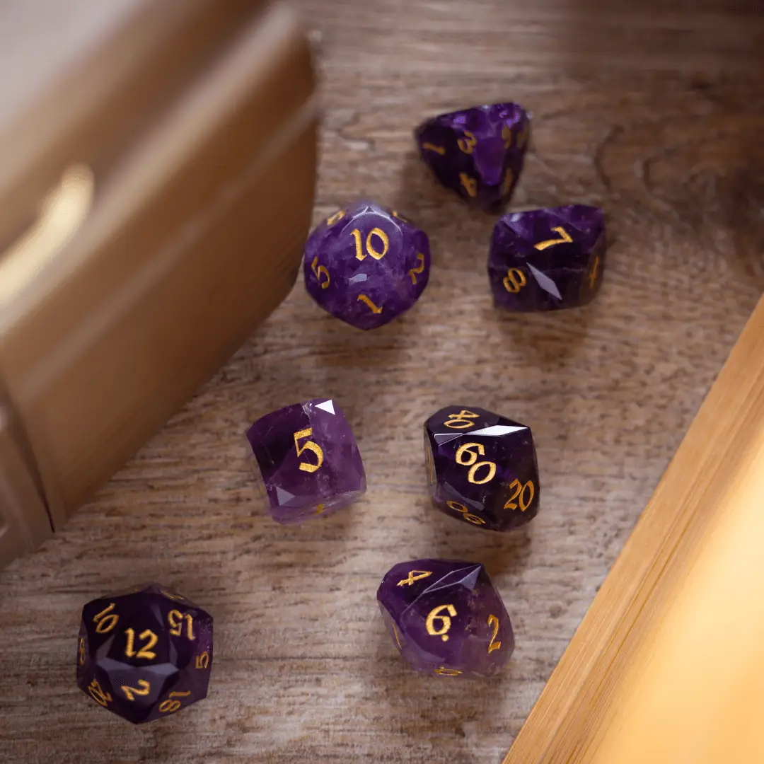 Purple amethyst gemstone DND dice set with dwarf cut design by Runic Dice, featuring polished, faceted gemstone dice for tabletop gaming.