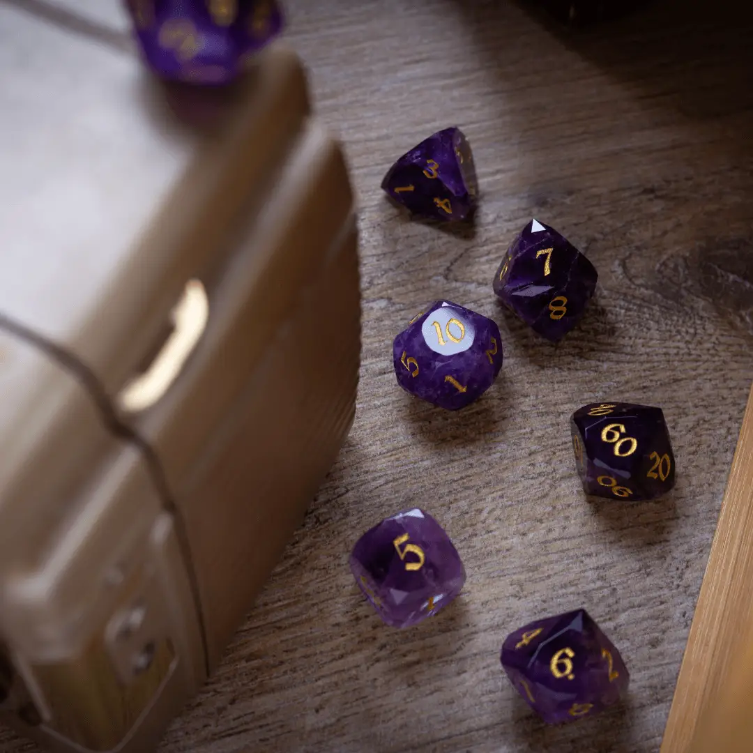 Purple amethyst gemstone DND dice set featuring dwarf-cut design by Runic Dice, with multiple polyhedral dice for gaming.