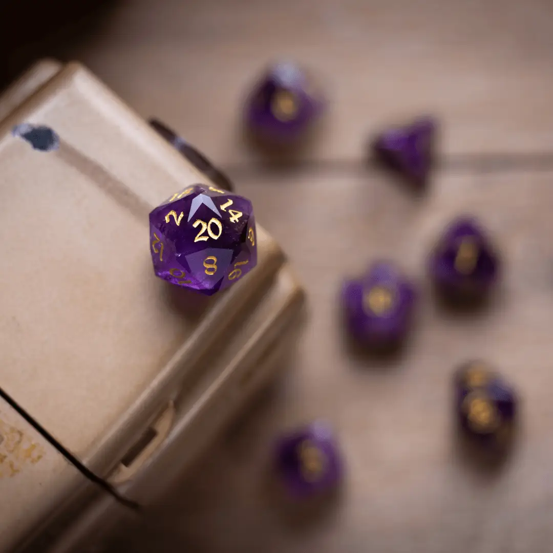 Purple amethyst gemstone DND dice set with dwarf-cut design by Runic Dice, featuring polished, vibrant gemstone dice for tabletop gaming.