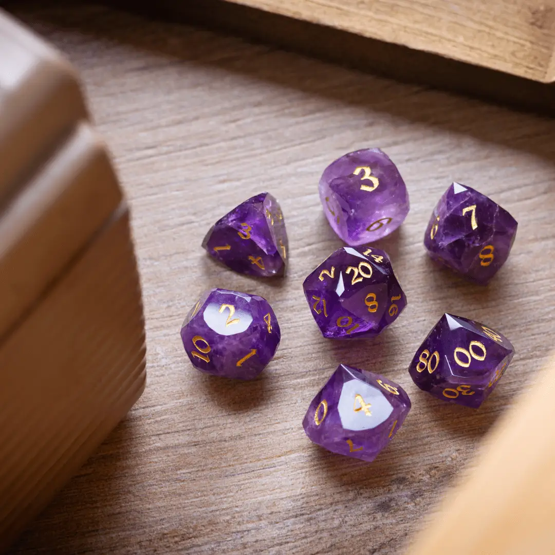 Purple amethyst gemstone DND dice set with dwarf cut facets from Runic Dice, featuring a premium gemstone design for tabletop gaming.