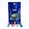 Two full sets of Mystery Misfit Mini polyhedral dice from THE MIGHTY HOBBY SHOP displayed on a fan roll.